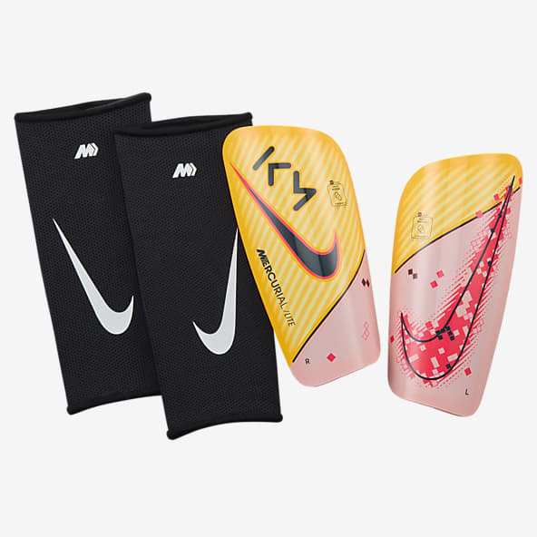 Espinilleras nike amarillas outlet